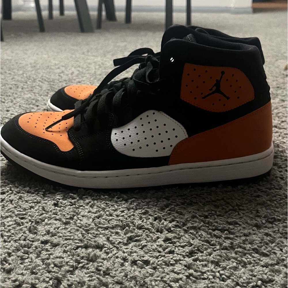 Orange and black Nikes